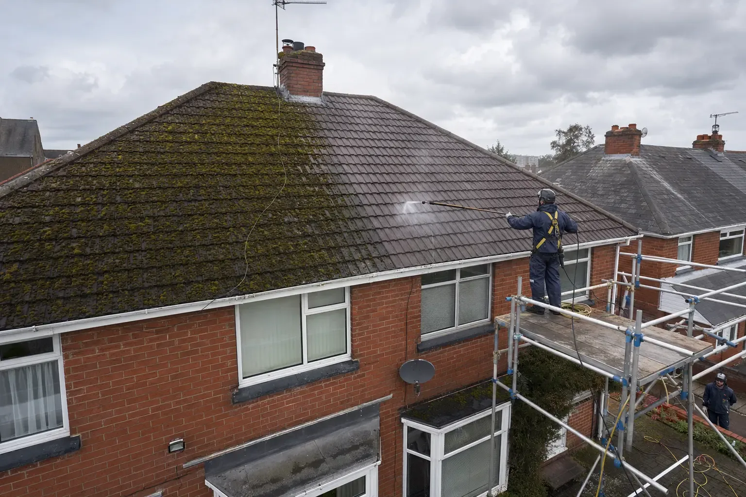 Professional roof cleaning from safe access at a Cardiff home
