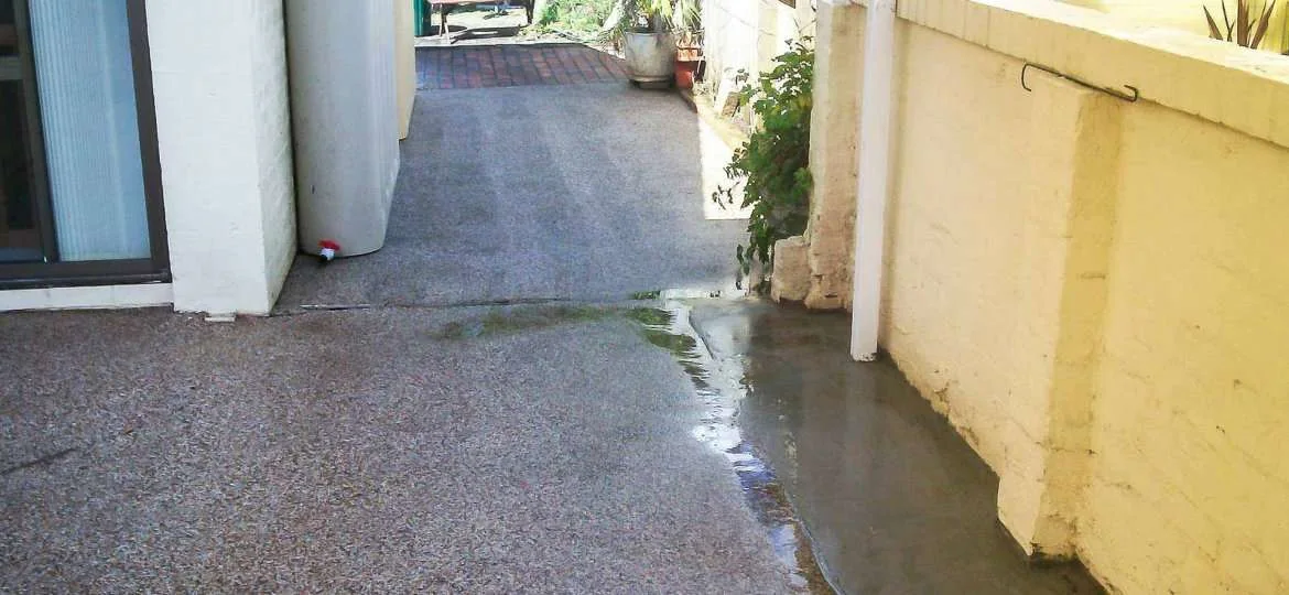 A concrete side path cleaned end to end